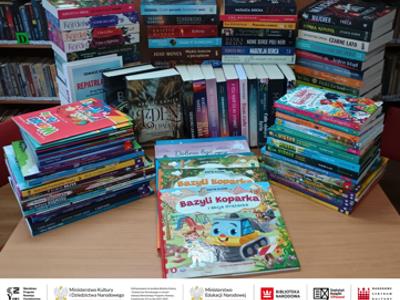 Alt="Zdjęcie przedstawia zakupione książki."