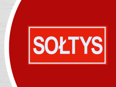 Baner z napisem Sołtys