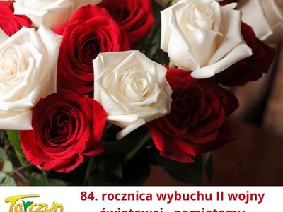 Zdjęcie przedstawia bukiet biało-czerwonych róż