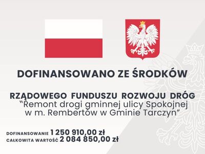 Tablica informująca o dofinansowaniu na remont ul Spokojnej