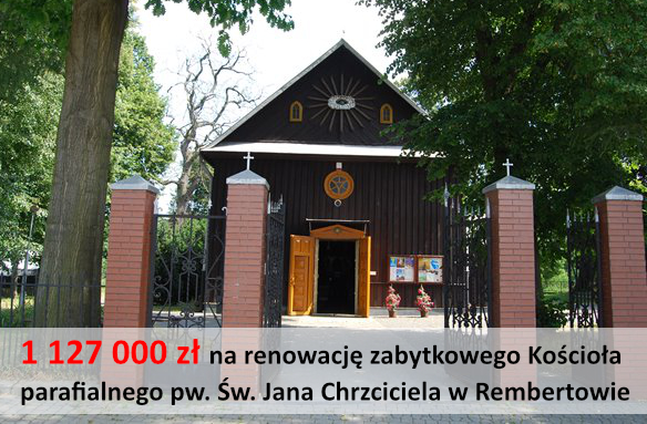 Zdjęcie przedstawia zabytkowy, drewniany kościół w Rembertowie