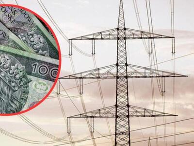 słup energetyczny i pieniądze