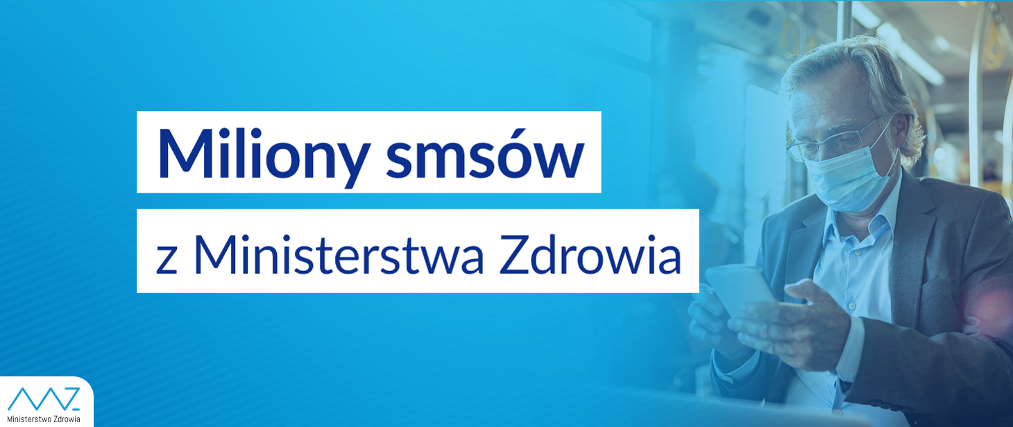 Zdjęcie przedstawia mężczyznę patrzącego w telefon komórkowy.