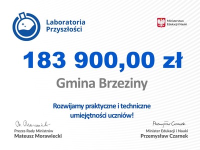 Czek na kwotę 183900,00 zł, niebieskie i szare litery