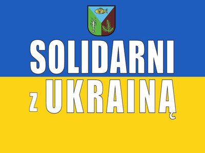 flaga Ukrainy niebiesko-żółta z napisem solidarni z Ukrainą i herbem Gminy Brzeziny