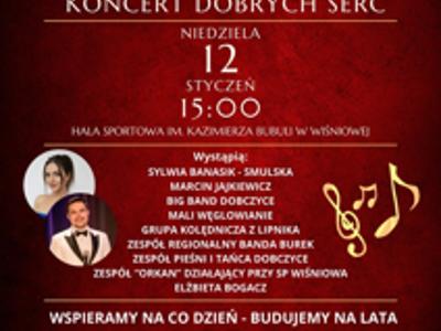 Czerwona grafika z zielonymi gałązkami i złotymi nutami. Informacja o Noworocznym Koncercie Dobrych Serc, 12.01.2025, godz. 15:00, hala w Wiśniowej.