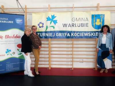 Przewodnicząca Rady Gminy, Dyrektor GOKSiT, Wójt Gminy na tle baneru turniej gryfa kociewskiego