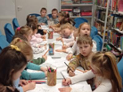 Dzień Kota z przedszkolakami w bibliotece