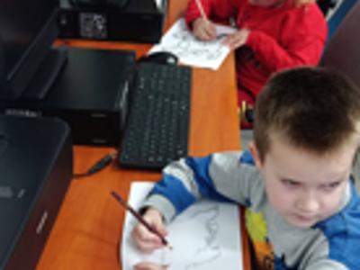 Dzień Kota z przedszkolakami w bibliotece