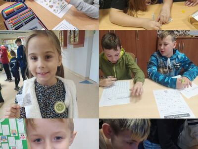 Obchody Dnia Tabliczki Mnożenia - dzieci wykonują zadania matematyczne.
