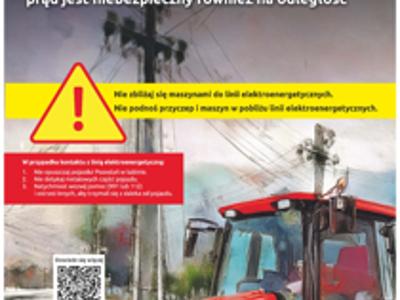 Zdjęcie plakatu zachowania ostrożności przy liniach elektroenergetycznych