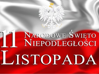Biały napis Narodowe Święto Niepodległości na biało - czerwonej fladze
