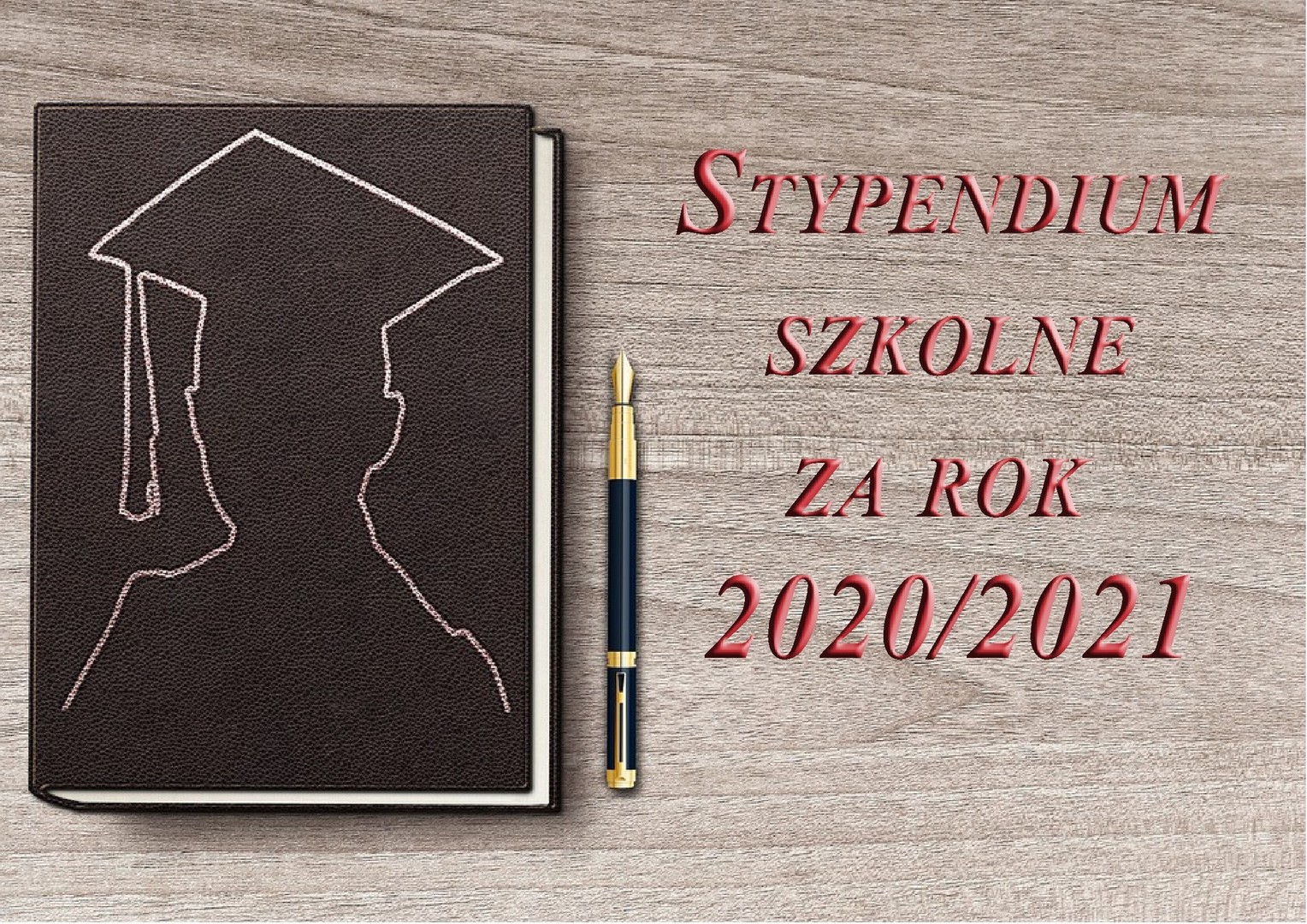 Czarny notatnik i czerwony napis stypendia szkolne