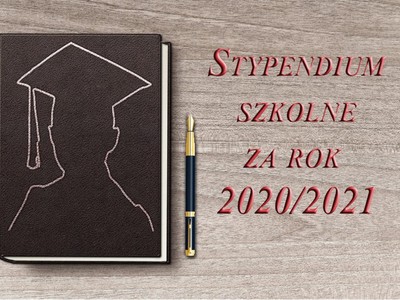 Czarny notatnik i czerwony napis stypendia szkolne