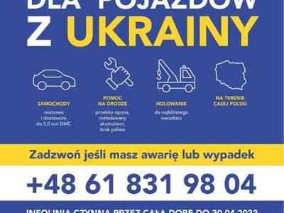 Zdjęcie komunikatu o bezpłatnej pomocy drogowej