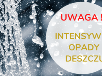 Na kroplach deszczu  napis "Uwaga!!! Intensywne opady deszczu"