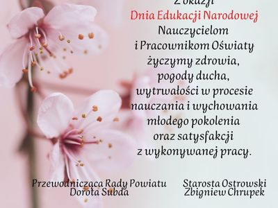 życzenia z okazji Dnia Edukacji Narodowej, w tle kwiaty